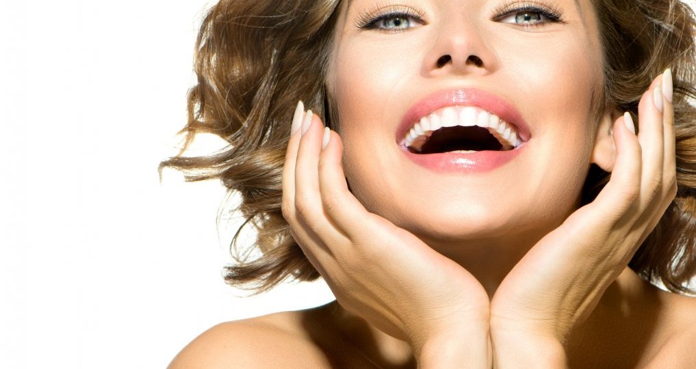 21749049 - beauty smiling young woman portrait over white background